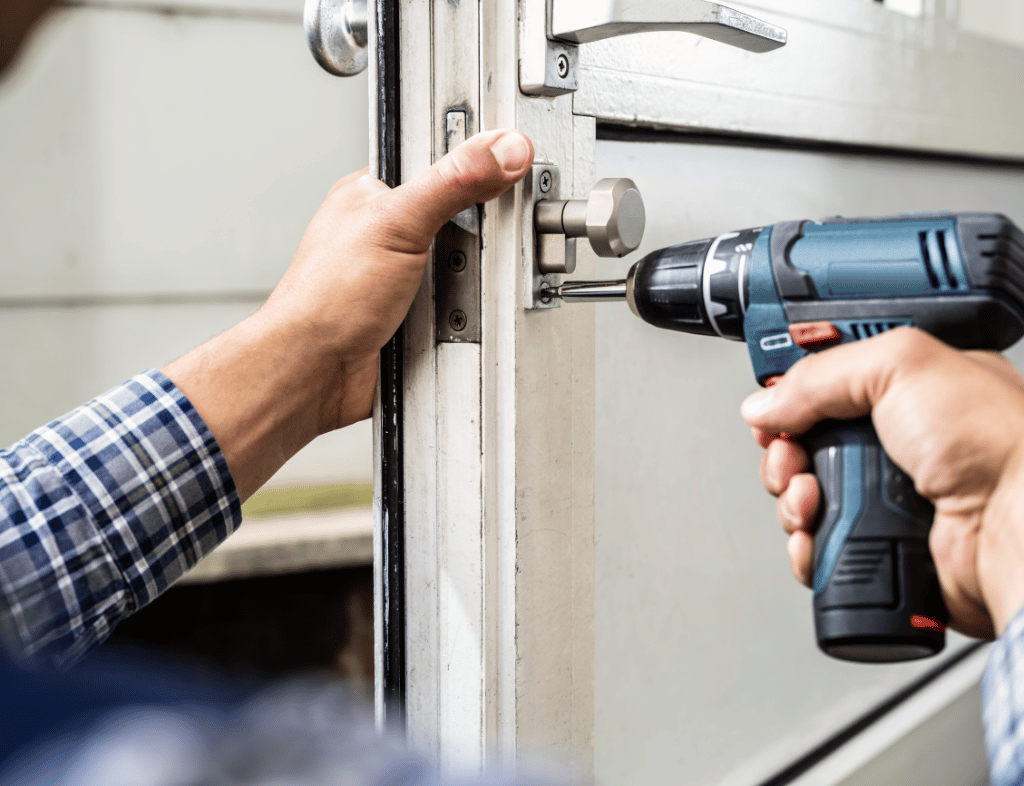 Technician at a commercial door keypad